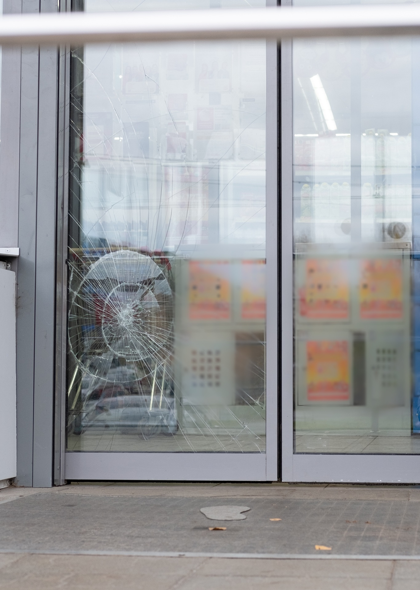 Image of a broken glass door for glass door repair in Albuquerque