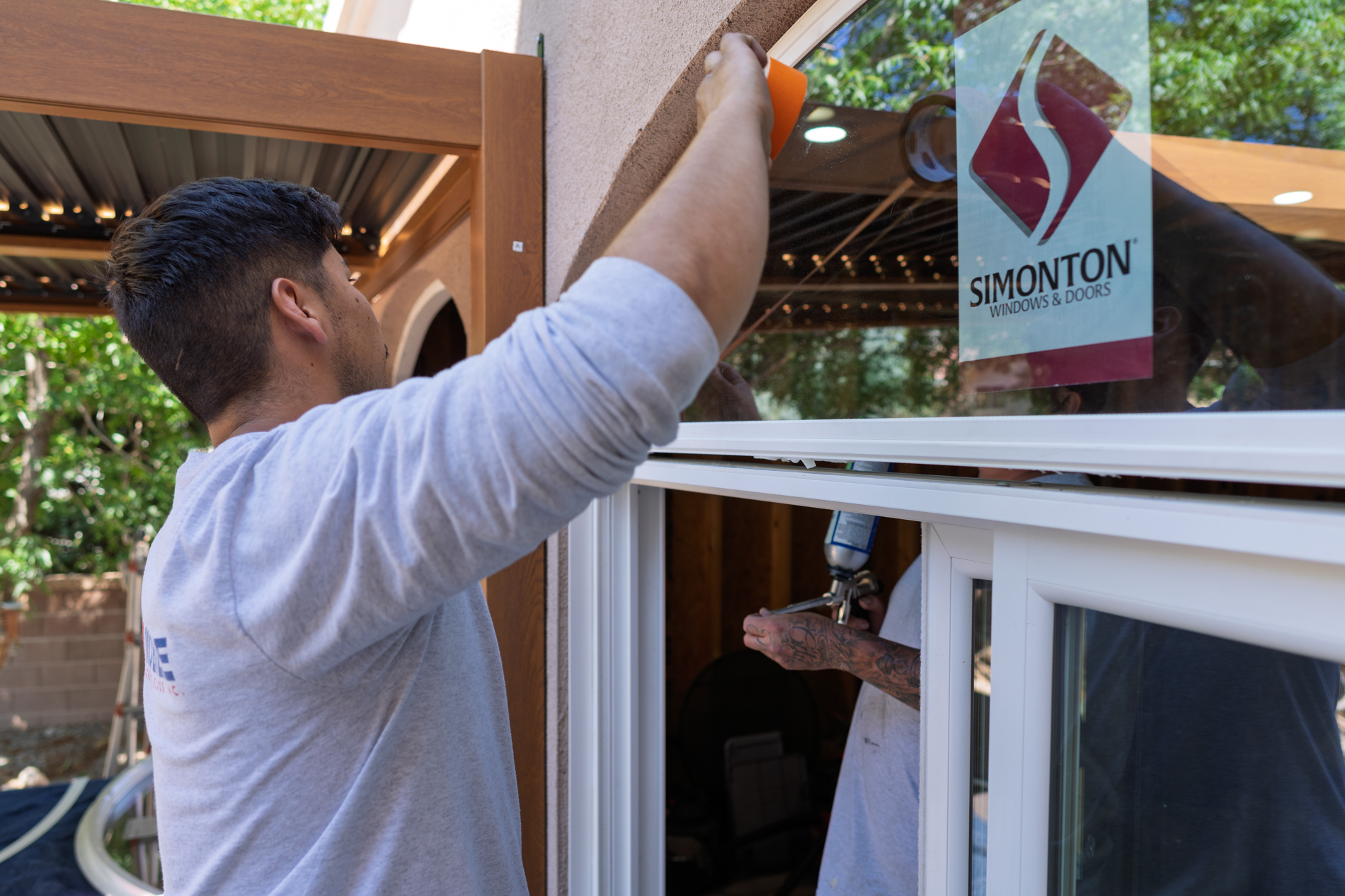 Image of glass technicians installing new glass windows
